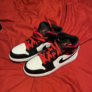 Big Kids Jordan Retro 1 Mid Black, Red, and White Sneakers